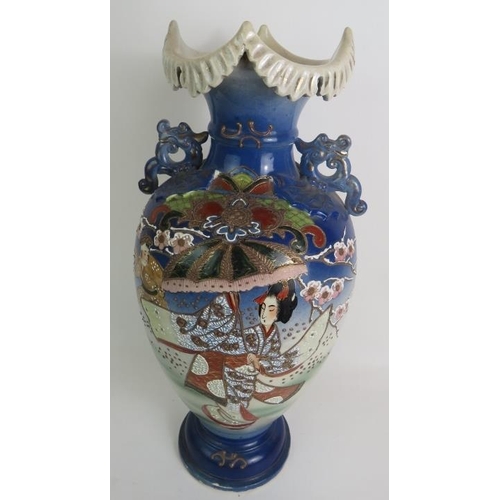 80 - A large Japanese Satsuma ware vase decorated with traditional Geisha scenes. Signed to base.