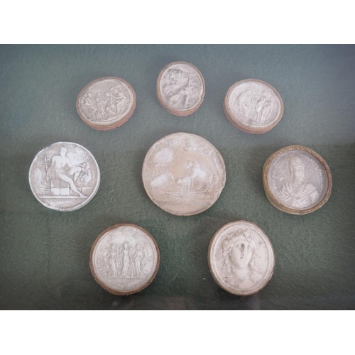 99 - A framed set of eight Grand Tour plaster intaglios plus a similar set of Composite Intaglios. Larges... 