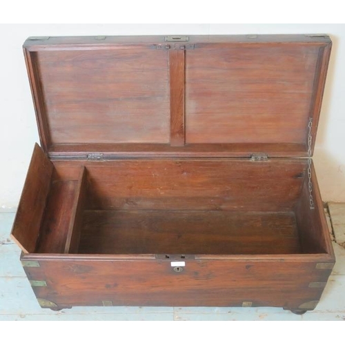 724 - A 19th century oak brass bound campaign chest with internal candle holder box, raised on bun feet.
4... 