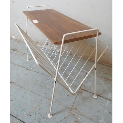 746 - A mid century white painted white metal & teak magazine rack.
40cm high x 48cm wide x 32cm deep (app... 