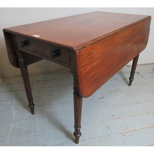 781 - A 19th Century mahogany drop leaf Pembroke table with a single drawer to one end over turned legs.
C... 