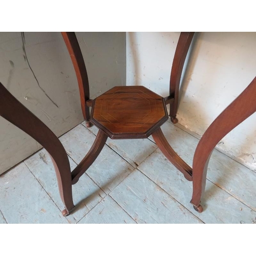 816 - An Edwardian Regency revival rosewood octagonal centre table with marquetry inlay and satinwood stru... 