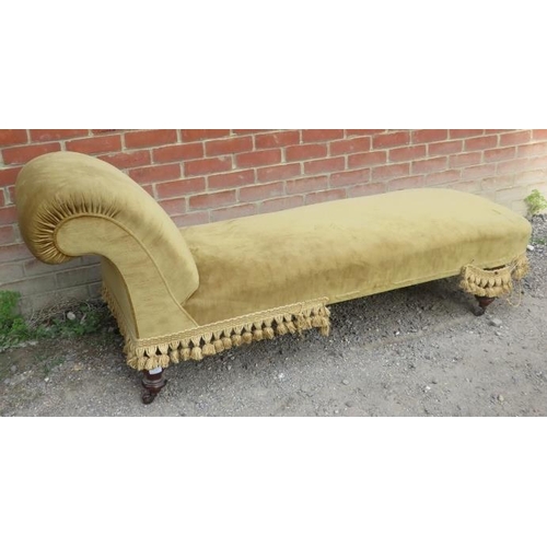 825 - A 19th century chaise longue upholstered in gold draylon, raised on tapering turned supports with ce... 