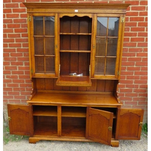 875 - A good quality reproduction solid oak period style wall unit.
Condition report: No issues. All keys ... 