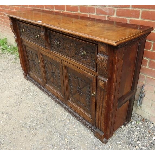 877 - A good quality reproduction solid oak period style sideboard.
Condition report: Sun fading to top.
9... 