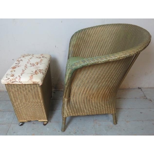 892 - A vintage Lloyd Loom 'Lusty' tub chair painted gold with sprung seat, together with associated linen... 