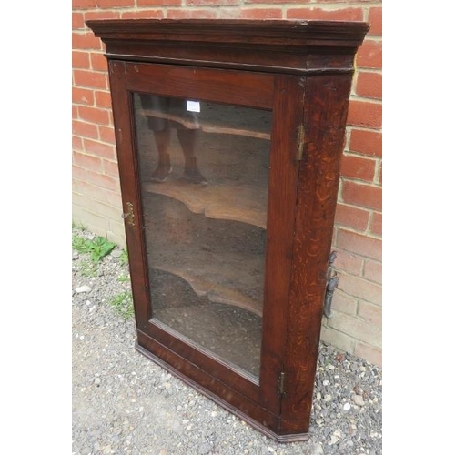 921 - A 19th century oak wall hanging glazed corner cupboard with three shaped shelves.
Condition report: ... 