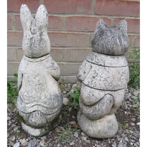 949 - A pair of reconstituted stone Beatrix Potter figures.
Condition report: Cat's ear is chipped.
40cm h... 