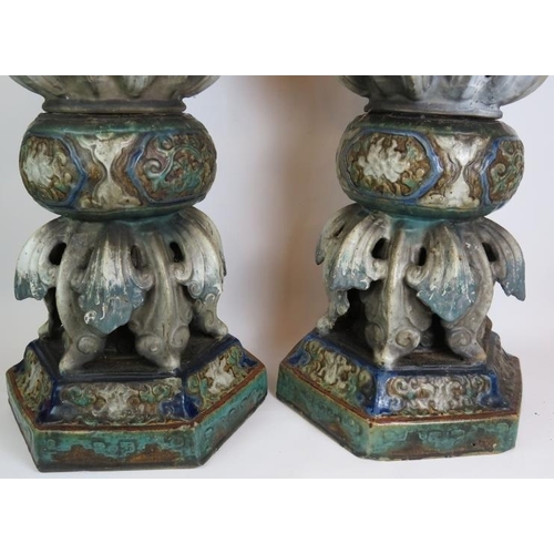 1 - A pair of antique highly ornate glazed stoneware Jardinière stands in the Chinese style both compris... 