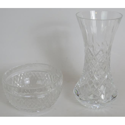 100 - A pair of Waterford crystal cruets with spare tops, pair of Waterford candlesticks, a Waterford suga... 