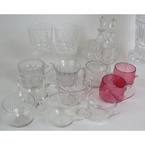 102 - A collection of 22 punch and custard glasses, a cut crystal jug, two tumblers, a 6 piece cruet set a... 