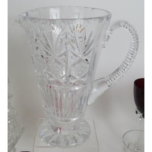 102 - A collection of 22 punch and custard glasses, a cut crystal jug, two tumblers, a 6 piece cruet set a... 