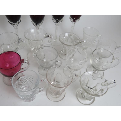 102 - A collection of 22 punch and custard glasses, a cut crystal jug, two tumblers, a 6 piece cruet set a... 