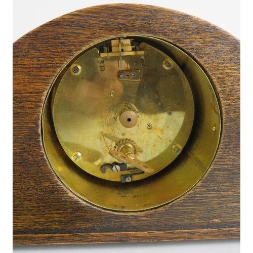 113 - An early 20th Century oak cased French mantel clock with enamel dial. Height 13.5cm.
Condition repor... 