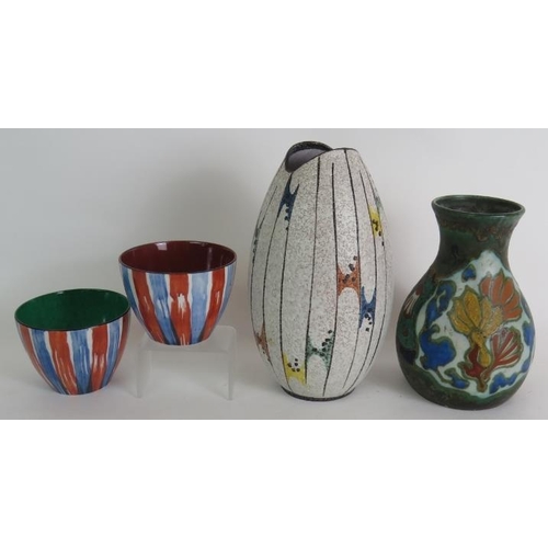 119 - An Amery Gouda pottery vase c1920, a 1950s Handgemalt studio vase and two signed bowls. (4).
Conditi... 