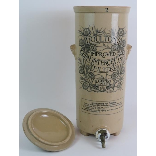 126 - An antique Doulton's Improved Germ Intercepting Filter Stoneware urn with lid and tap. Overall heigh... 