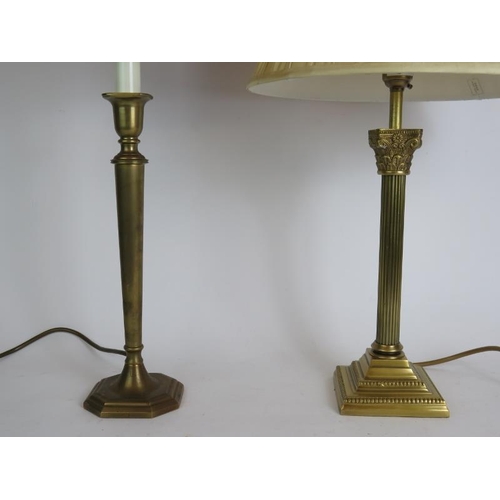 132 - Two brass candlestick column lamps, one Corinthian and one Georgian style, both with shades. Tallest... 