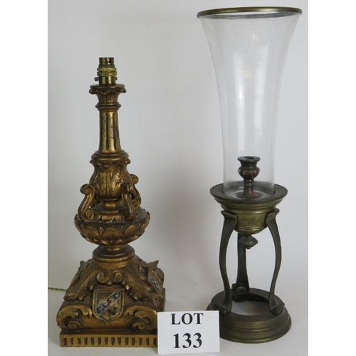 133 - An ornate carved gilt wood and gesso table lamp with acanthus leaf decoration and hand painted armor... 