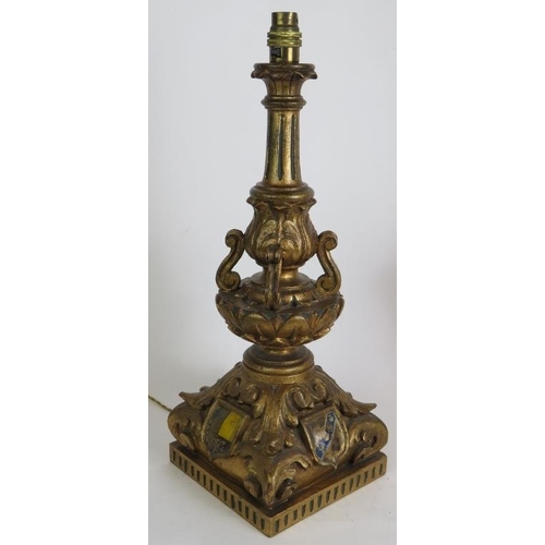 133 - An ornate carved gilt wood and gesso table lamp with acanthus leaf decoration and hand painted armor... 