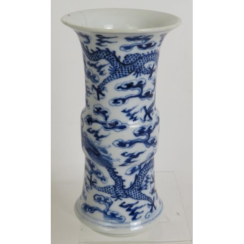 14 - A small antique Chinese porcelain sleeve vase decorated with two pearl chasing dragons, four charact... 