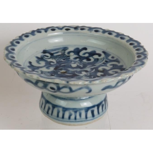 149 - An antique Chinese porcelain pedestal dish with blue and white decoration and single character mark ... 