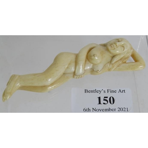 150 - A carved ivory female diagnostic modesty figure, probably Chinese c1920s. Length 9.5cm.
Condition re... 