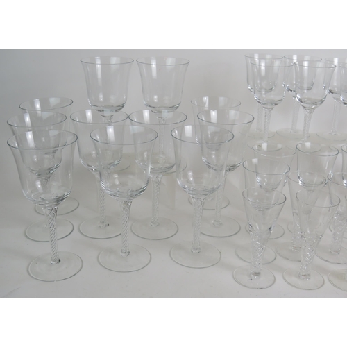 154 - A suite of 38 contemporary air twist drinking glasses to include 11 red wine, 10 white wine, 11 sher... 