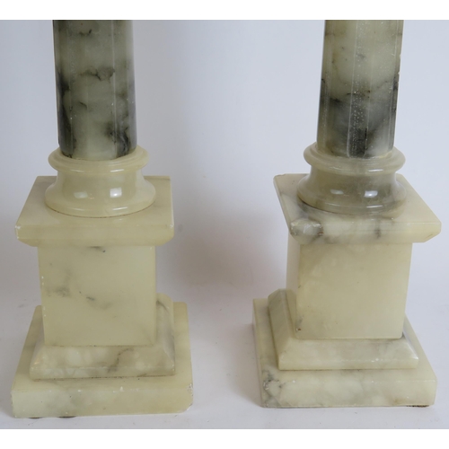 155 - A pair of white Alabaster Ionic column table lamps, overall height 43cm. (pr).
Condition report: Nee... 