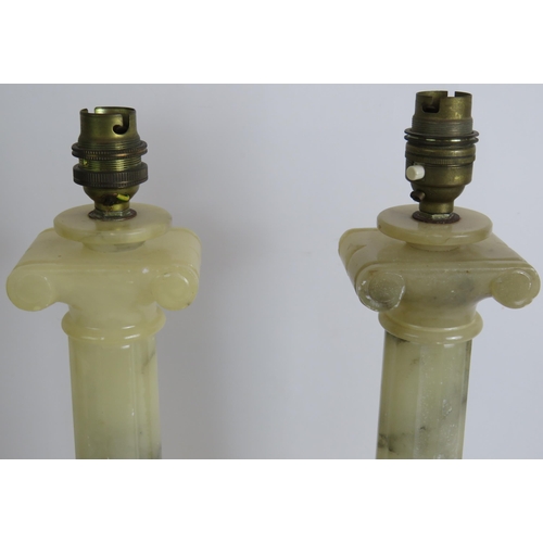 155 - A pair of white Alabaster Ionic column table lamps, overall height 43cm. (pr).
Condition report: Nee... 