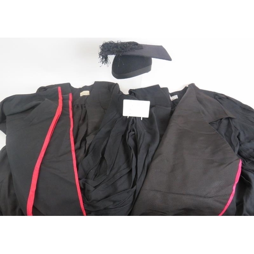 157 - Two black graduation gowns and a mortar board size 6 5/8. (5).
Condition report: No issues.