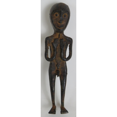 164 - A small bronze Ethnic tribal figure, probably West African, depicting a man with a crocodile symbol ... 