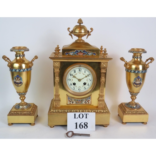 168 - A late 19th Century gilt brass French mantel clock garniture in the Empire style with champlevé enam... 