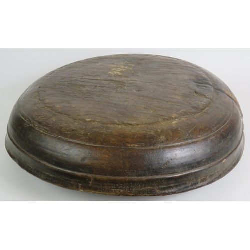 17 - A large antique country oak dairy or dough bowl with turned rim and aged patination. Max diameter 52... 