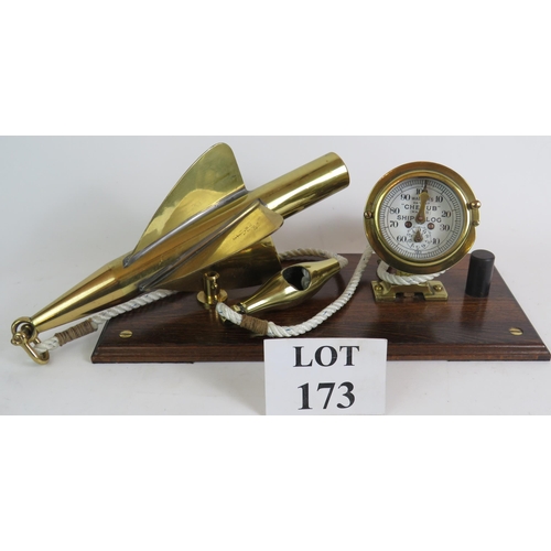 173 - An antique brass Walker's Cherub Mark II ship's log and spinner mounted on a polished oak base. Leng... 