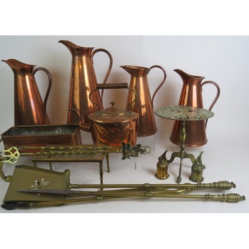 175 - A collection of antique and vintage brass and copper wares including four Joseph Sankey jugs, fire i... 