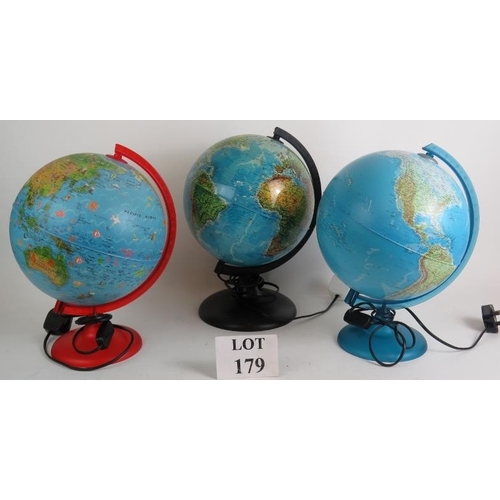 179 - Three contemporary terrestrial globe lights, each 36cm tall. (3).
Condition report: One with scuff m... 