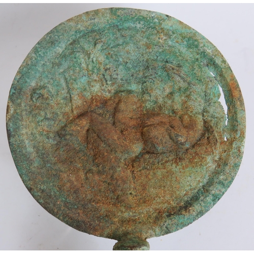 18 - An Etruscan style bronze mirror possible Archaic, formed from an open armed figural handle supportin... 