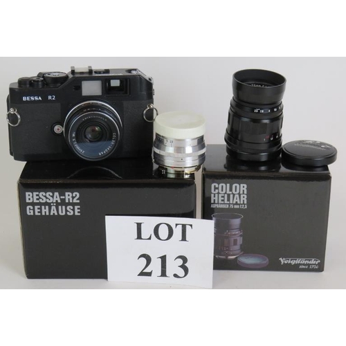 213 - A Voigtlander Bessa R2 camera with 35mm F2.5 lens and a color-Heliar 75mm F2.5 lens and a Jupiter-8 ... 