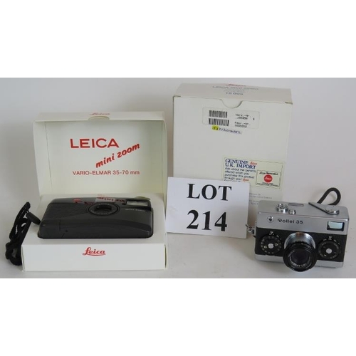 214 - A Leica mini-zoom 35-70mm compact camera with original packaging and a Rollei 35 compact 35mm camera... 