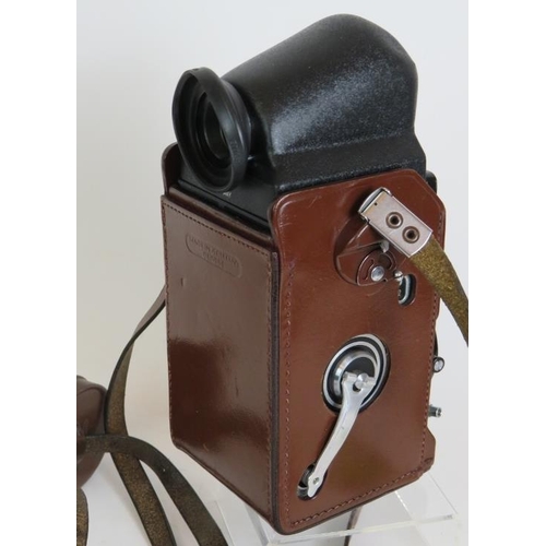 215 - A Rolleiflex T model 1 TLR camera with 75mm F3.5 Zeiss lenses, leather case, filters and pentaprism ... 