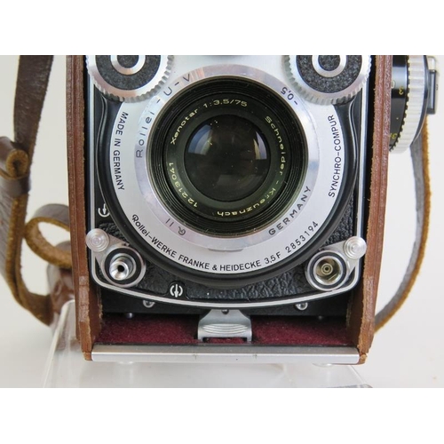 216 - A Rolleiflex 3.5 F model 3 No 2853194 TLR camera with 75mm F2.8 Xenotar lenses, leather case and acc... 