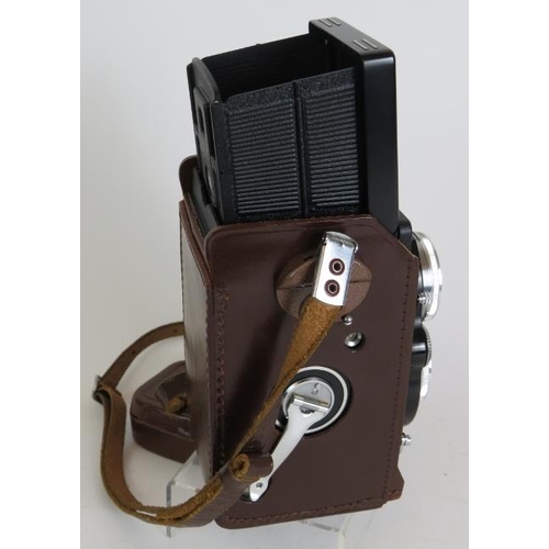 216 - A Rolleiflex 3.5 F model 3 No 2853194 TLR camera with 75mm F2.8 Xenotar lenses, leather case and acc... 