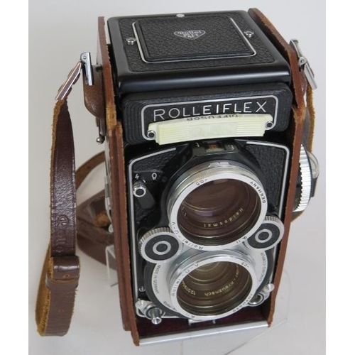 216 - A Rolleiflex 3.5 F model 3 No 2853194 TLR camera with 75mm F2.8 Xenotar lenses, leather case and acc... 