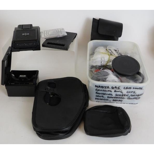 218 - A Mamiya 645 1000S camera No L153212 plus seven lenses, bellows, grips, viewfinders and various othe... 