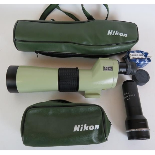 222 - A Nikon spotting scope with 20x eyepiece plus a Nikon camera converter (800mm), carry cases and a Ve... 