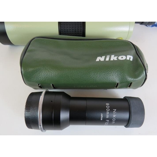 222 - A Nikon spotting scope with 20x eyepiece plus a Nikon camera converter (800mm), carry cases and a Ve... 