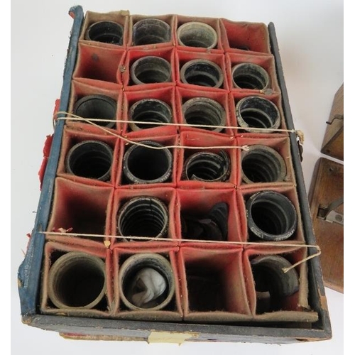 28 - A cylinder phonograph mechanism in wooden case, a steel horn and quantity of wax cylinders. 
Conditi... 