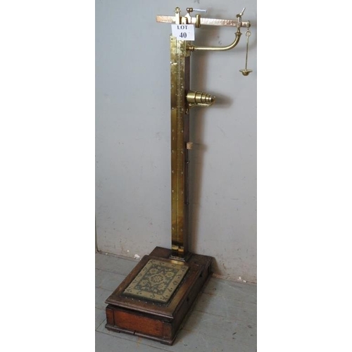 40 - A set of Victorian brass and oak stand on Avery weighing scales with complete set of weights, possib... 