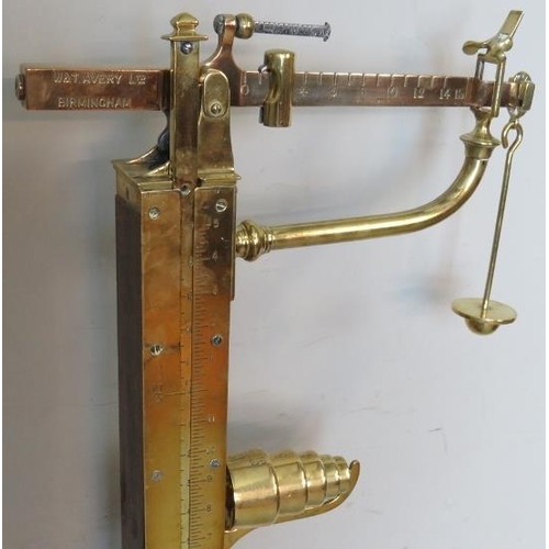 40 - A set of Victorian brass and oak stand on Avery weighing scales with complete set of weights, possib... 