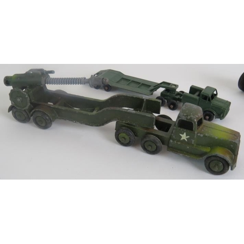 43 - Three Diecast Britain's Cannons and five other Military vehicles including a tin plate tank. (8).
Co... 